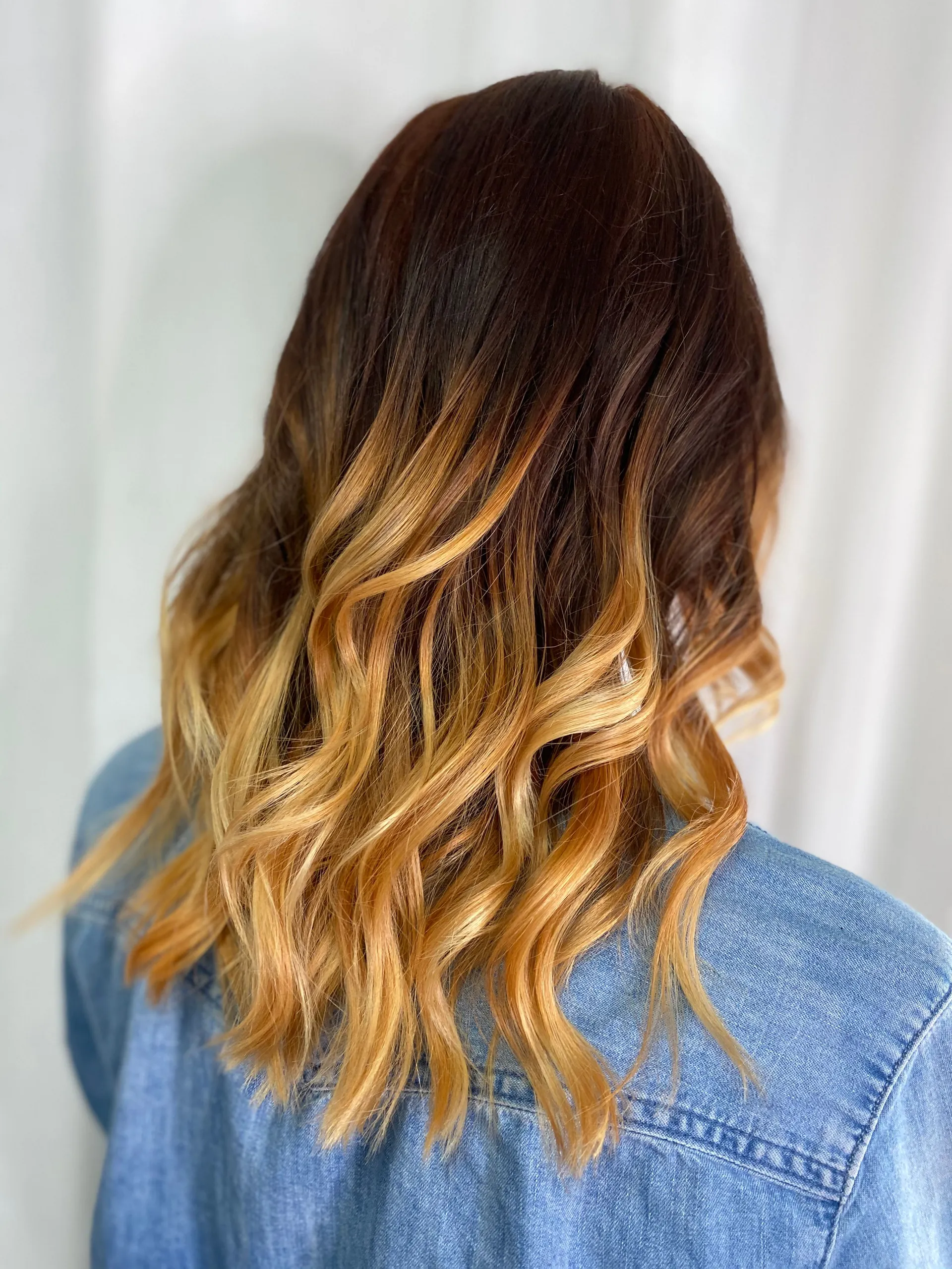 Balayage from dark brown to honey