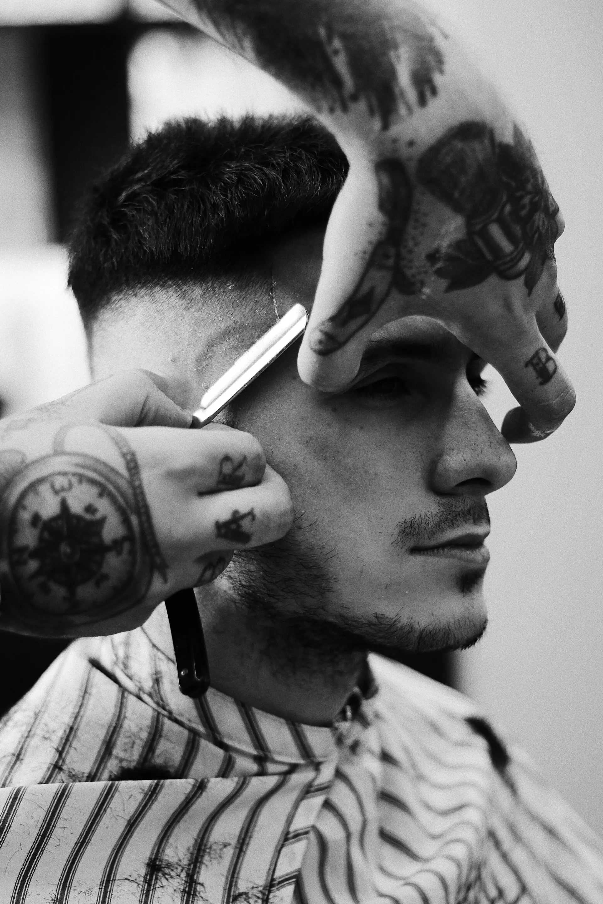 Straight-razor shave and fade, black and white